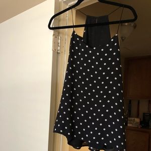 Polka dot black and white strap blouse